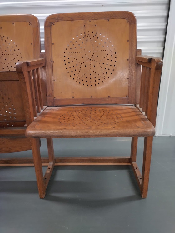 Image 1 of 3x auction chairs with folding table on the back