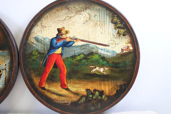 Image 1 of 2 hand-painted wall plates with a hunting scene