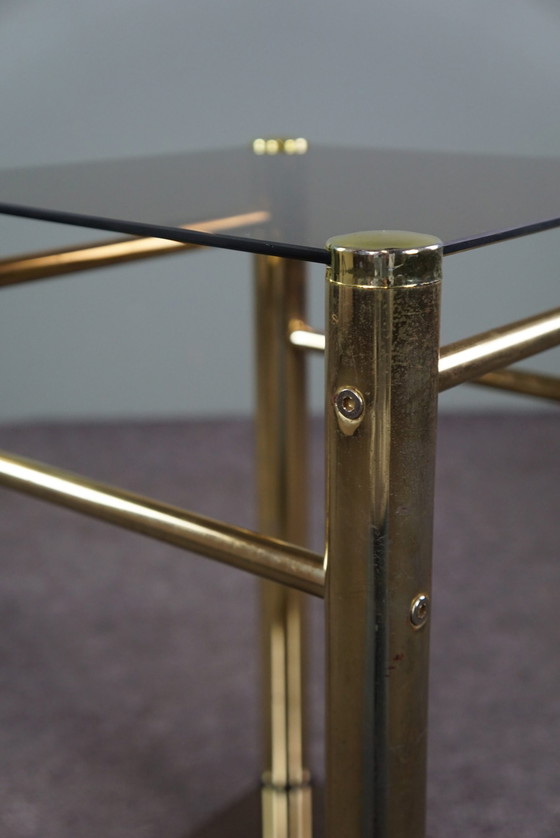 Image 1 of Gold Hollywood Regency smoked glass side table, column