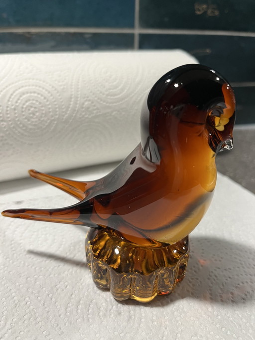 Oiseau en verre ambré