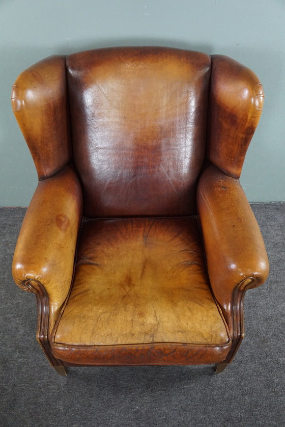 Image 1 of Fauteuil à oreilles en cuir de mouton marron