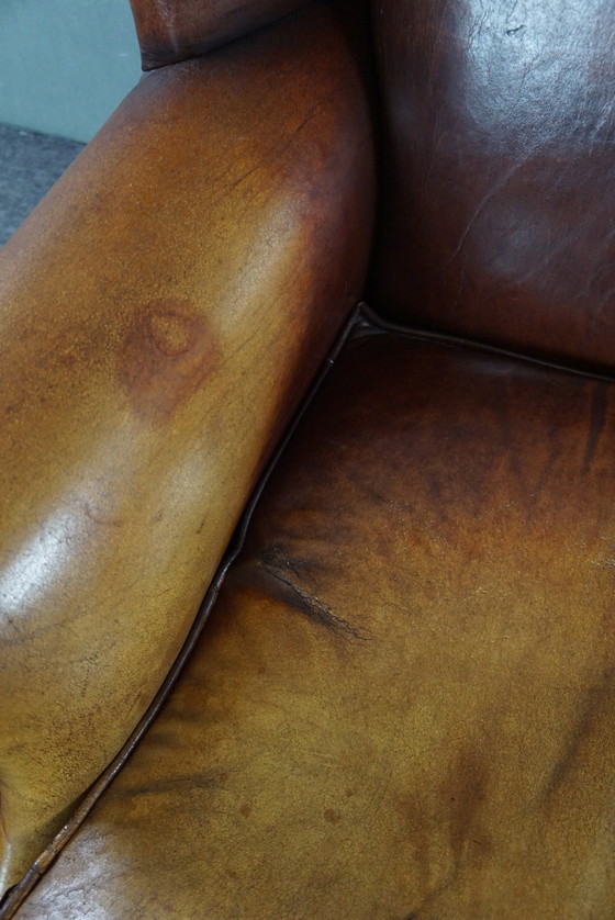 Image 1 of Fauteuil à oreilles en cuir de mouton marron