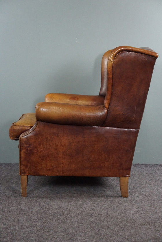 Image 1 of Fauteuil à oreilles en cuir de mouton marron