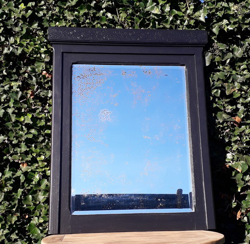 Vintage wooden mirror weathered glass