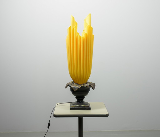 XXL Georgia Jacob Athena Flaming Torch table lamp in resin sculpted fabric on Bronze patinated Stone base. France, 1970s