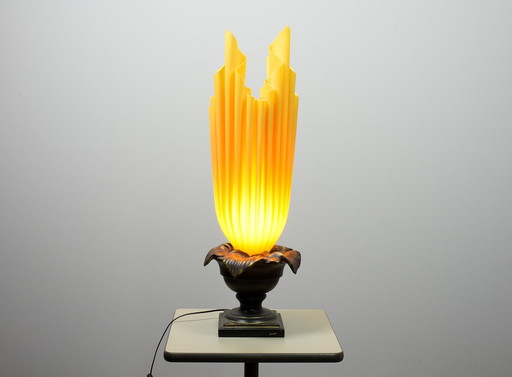 XXL Georgia Jacob Athena Flaming Torch table lamp in resin sculpted fabric on Bronze patinated Stone base. France, 1970s