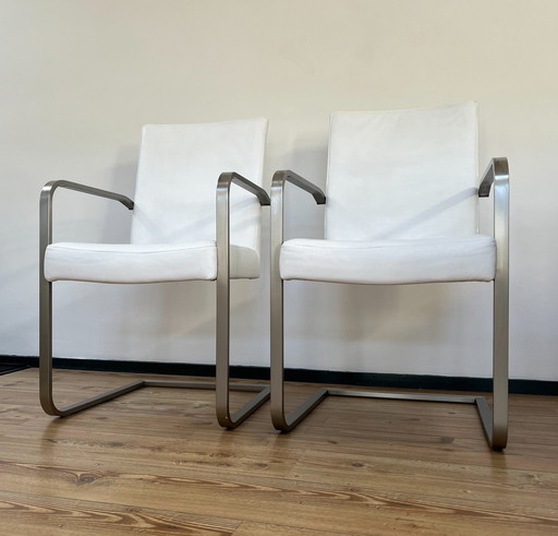 2x White leather design chairs