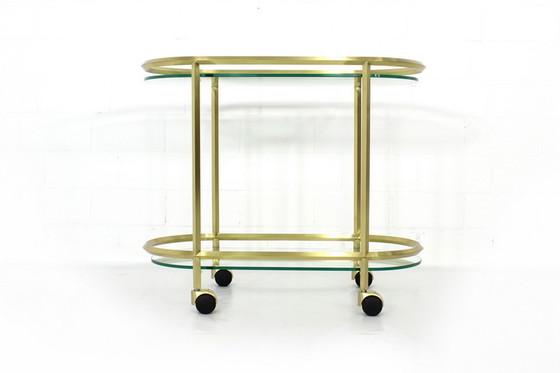 Image 1 of United workshops Hollywood Regency golden serving trolley / bar trolley