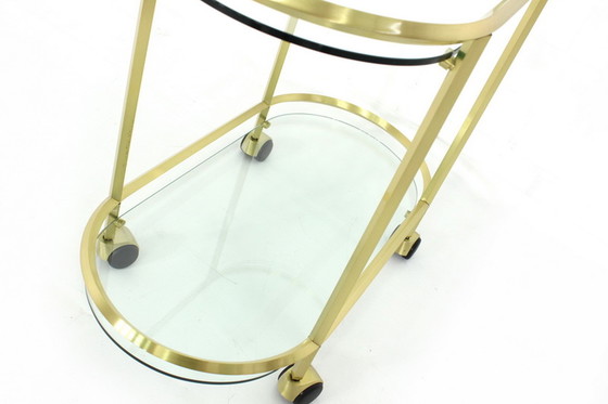 Image 1 of United workshops Hollywood Regency golden serving trolley / bar trolley