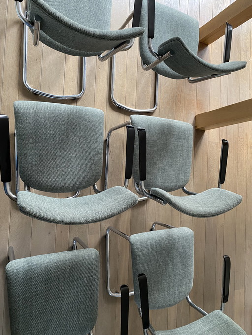 6 x De Dykmeyer Purmer tubular frame chairs with armrests.