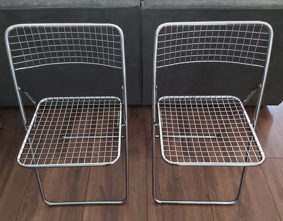 Image 1 of 2x Niels Gammelgaard wire folding chairs.