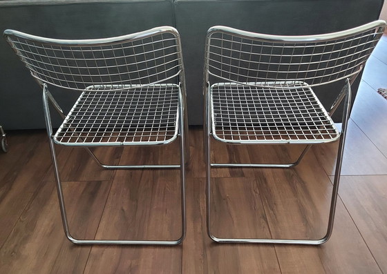 Image 1 of 2x Niels Gammelgaard wire folding chairs.