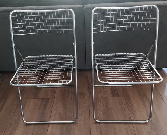 Image 1 of 2x Niels Gammelgaard wire folding chairs.