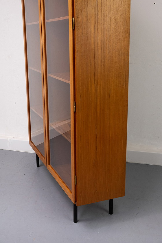 Image 1 of Omann Jun Teak Showcase