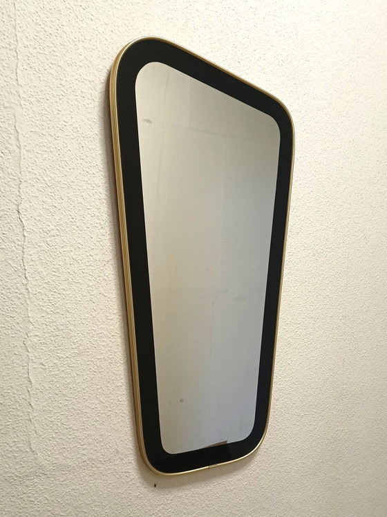 Image 1 of Miroir des années 50 de forme inhabituelle avec un large bord noir