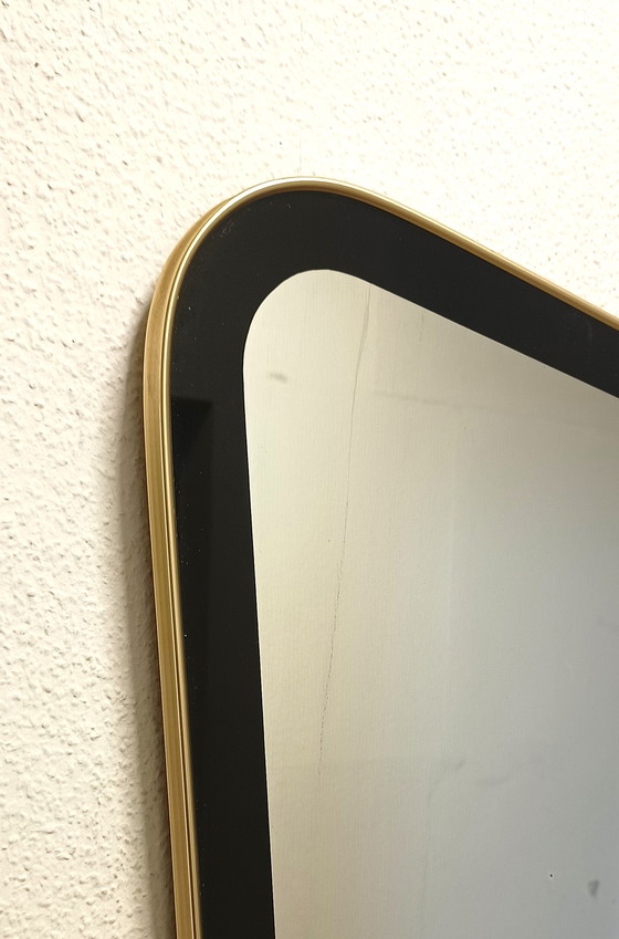 Image 1 of Fifties mirror in unusual shape with wide black edge