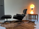 Poltrona e pouf Eames Lounge Chair di Vitra