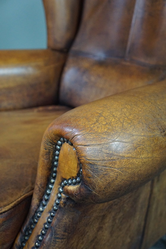 Image 1 of Well-fitting sheepskin leather wing chair