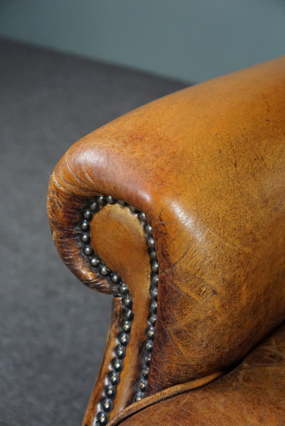 Image 1 of Well-fitting sheepskin leather wing chair