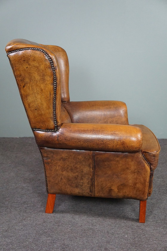 Image 1 of Well-fitting sheepskin leather wing chair