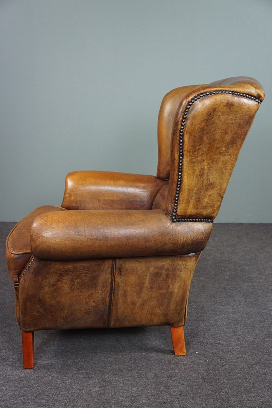 Image 1 of Well-fitting sheepskin leather wing chair