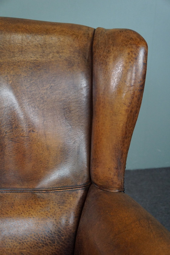 Image 1 of Well-fitting sheepskin leather wing chair