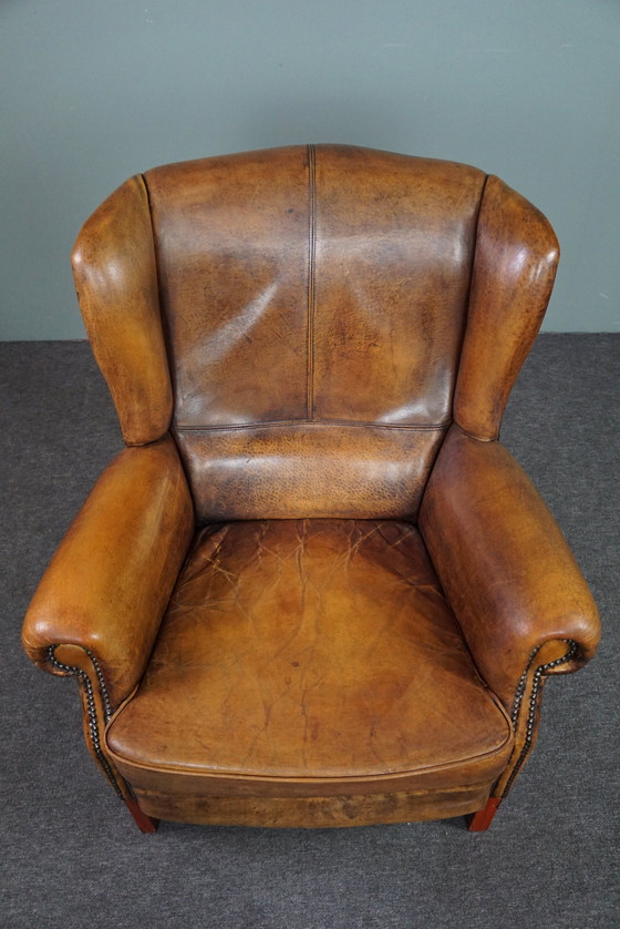 Image 1 of Well-fitting sheepskin leather wing chair