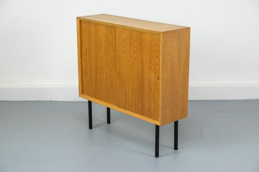 Small oak cabinet with sliding doors, 1960s