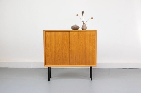 Image 1 of Small oak cabinet with sliding doors, 1960s