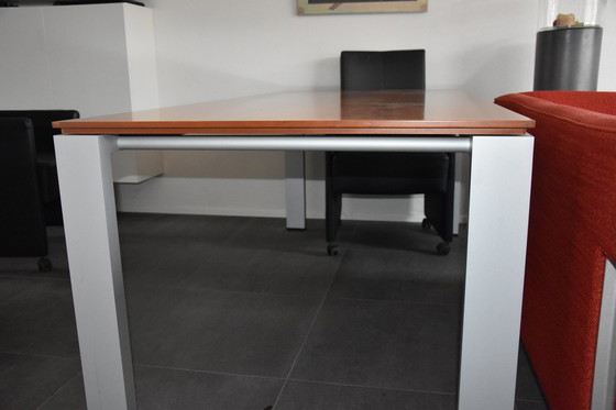 Image 1 of Dining table by ARCO with pear wood top and aluminum base.