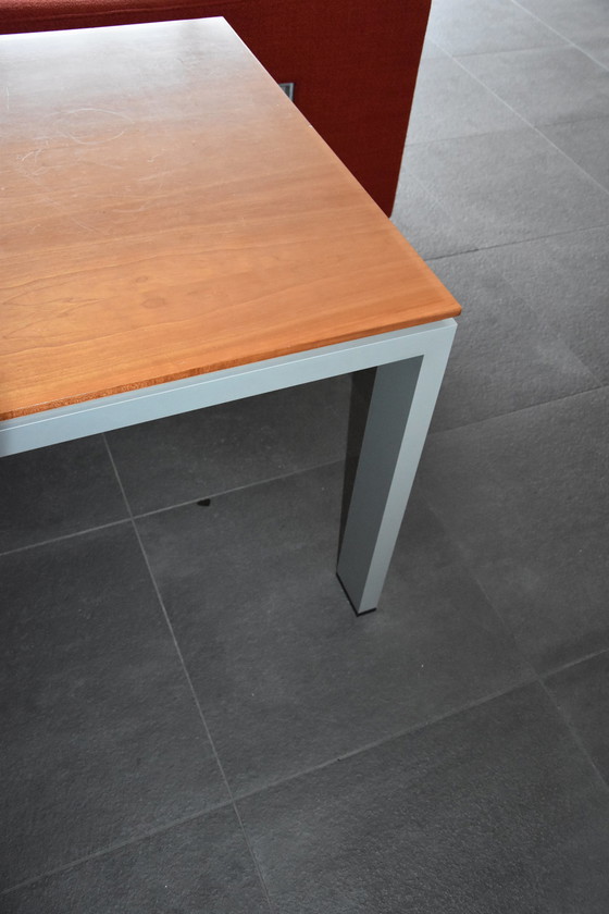 Image 1 of Dining table by ARCO with pear wood top and aluminum base.