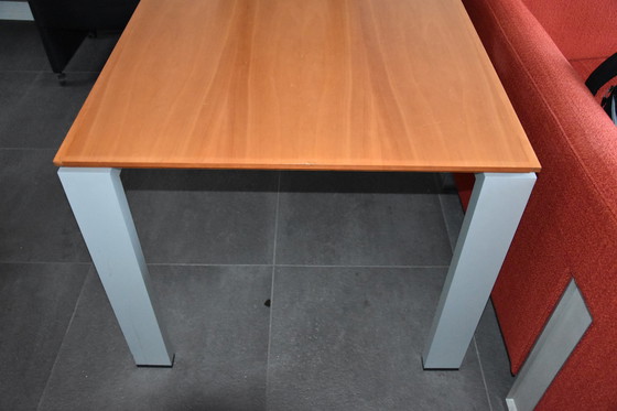 Image 1 of Dining table by ARCO with pear wood top and aluminum base.