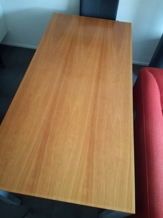 Image 1 of Dining table by ARCO with pear wood top and aluminum base.