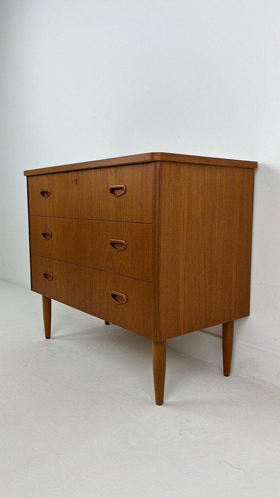 Image 1 of Teak veneer Swedish chest of drawers