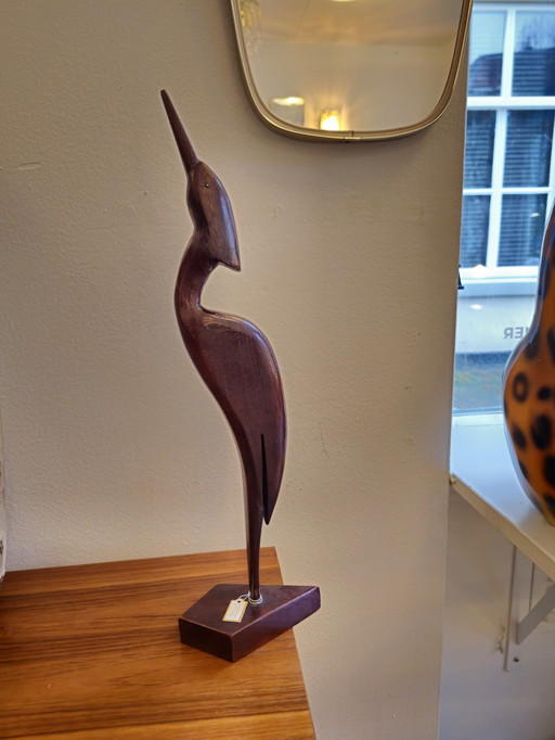 Grue vintage en bois sculptée