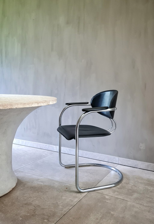 tubular frame armchair