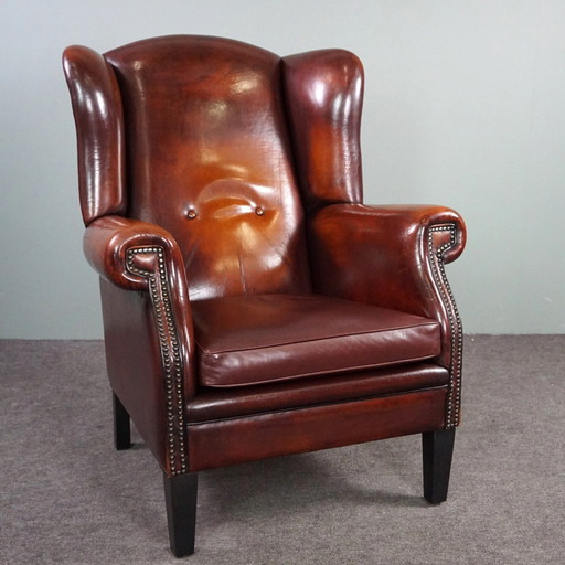 Fauteuil à oreilles en peau de mouton