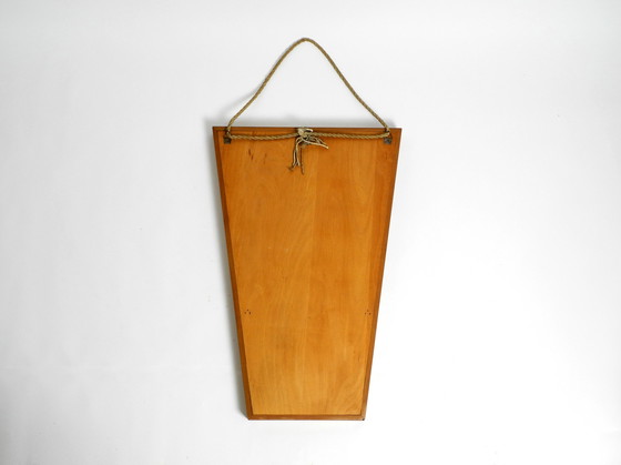 Image 1 of Beautiful large Mid Century wall mirror in trapezoidal shape with a solid cherry wood frame