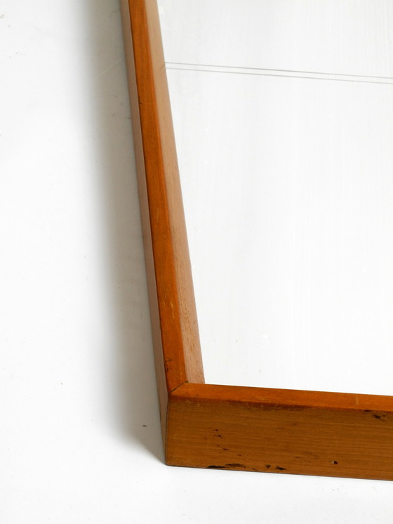 Image 1 of Beautiful large Mid Century wall mirror in trapezoidal shape with a solid cherry wood frame