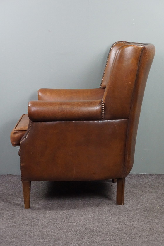 Image 1 of Stunning patinated sheepskin leather armchair