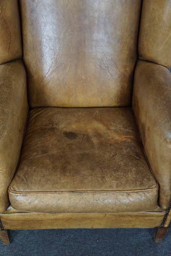 Image 1 of Fauteuil à oreilles en cuir de mouton clair