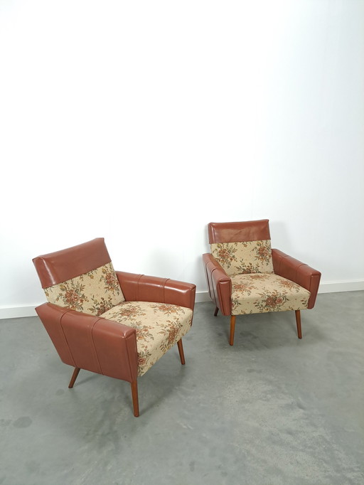 Armchairs with floral upholstery and artificial leather