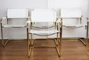 4 sedie vintage con struttura tubolare cromata dorata