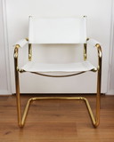 4 sedie vintage con struttura tubolare cromata dorata