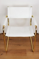 4 sedie vintage con struttura tubolare cromata dorata