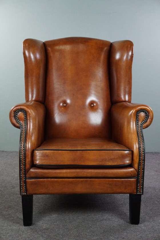 Image 1 of Grand fauteuil à oreilles en cuir de mouton