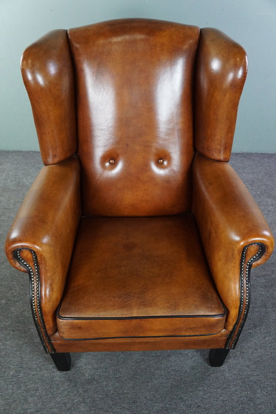 Image 1 of Grand fauteuil à oreilles en cuir de mouton