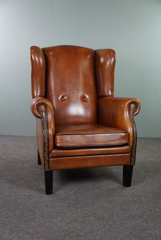 Image 1 of Grand fauteuil à oreilles en cuir de mouton