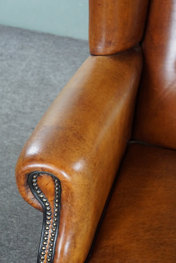 Image 1 of Grand fauteuil à oreilles en cuir de mouton