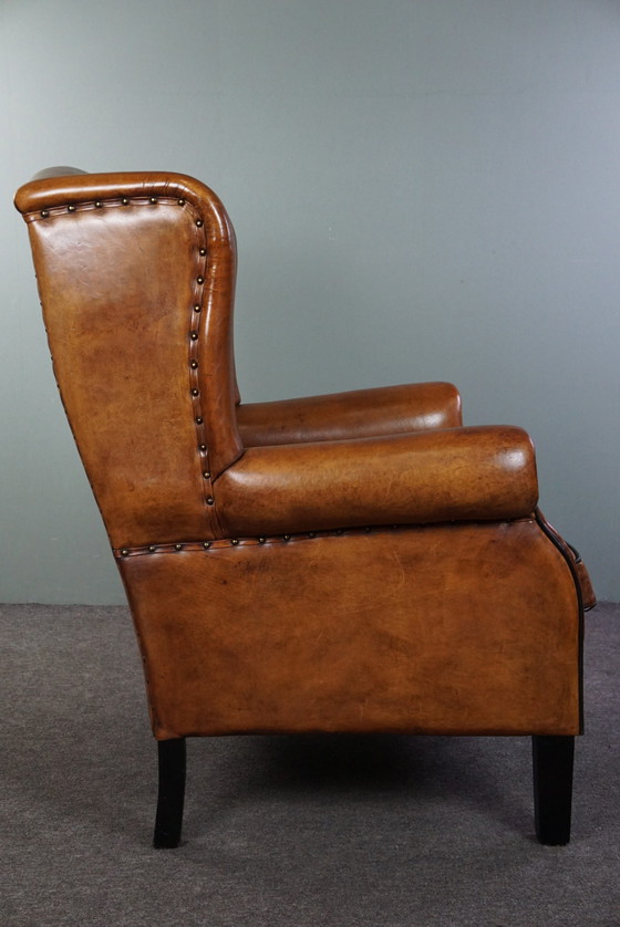 Image 1 of Grand fauteuil à oreilles en cuir de mouton